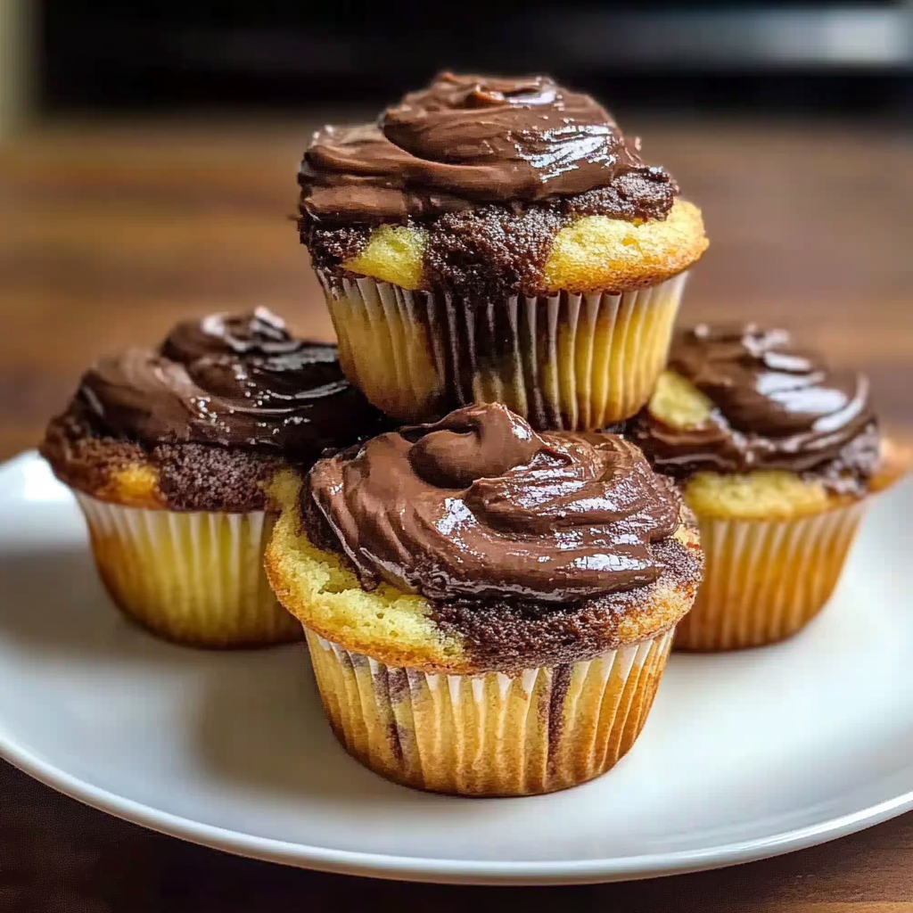 Recipe preparation for Nutella Banana Swirl Muffins